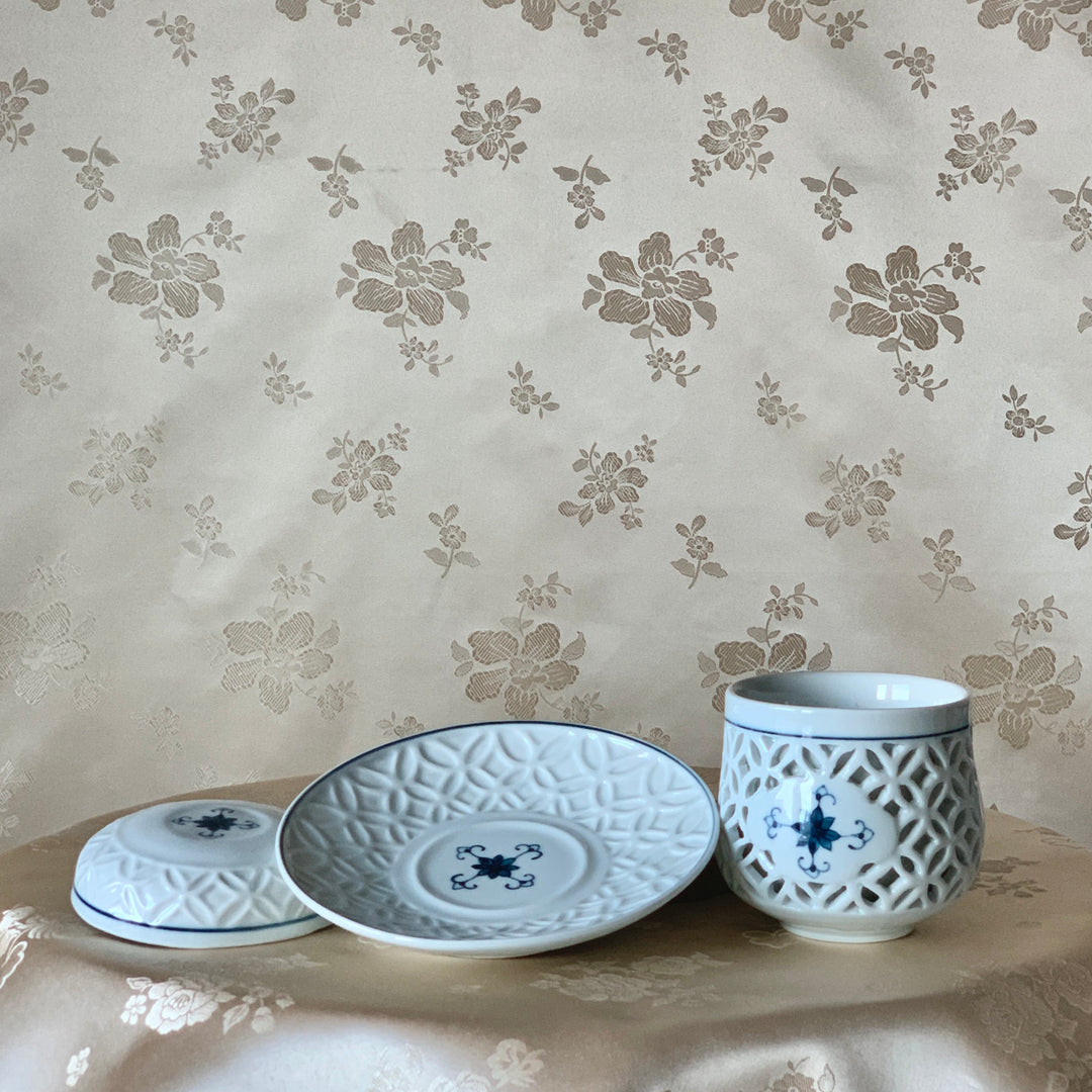 White Porcelain Double Wall Openwork Tea Cup with Chrysanthemum and Chilbo Pattern (백자 국화 칠보문 이중투각 찻잔)