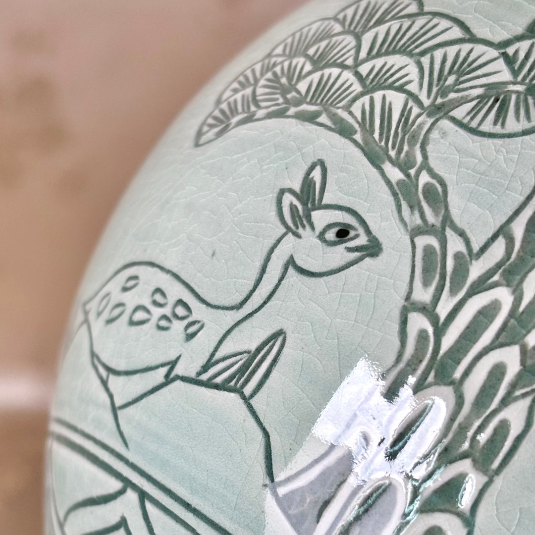 White Celadon Vase with Engraved Pine Tree, Crane and Deer Pattern