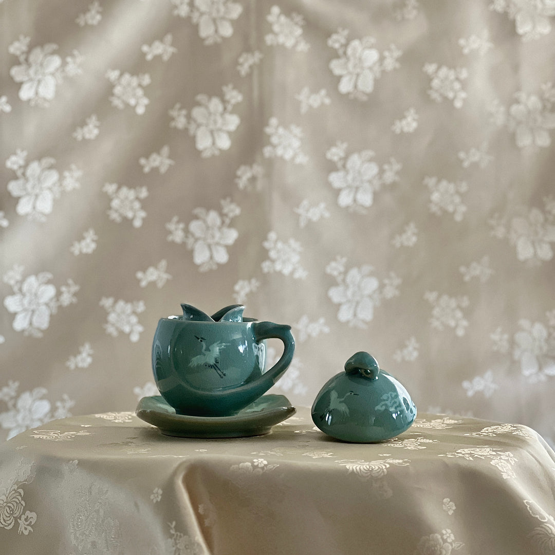 Celadon Tea Cup: Crane Egg Shaped, Inlaid Crane and Cloud Motif
