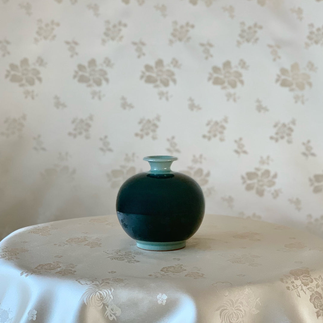 Black Celadon Vase with Embossed Magnolia Pattern (청자 흑상감 양각 목련문 호)