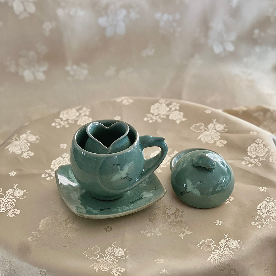 Celadon Tea Cup: Crane Egg Shaped, Inlaid Crane and Cloud Motif