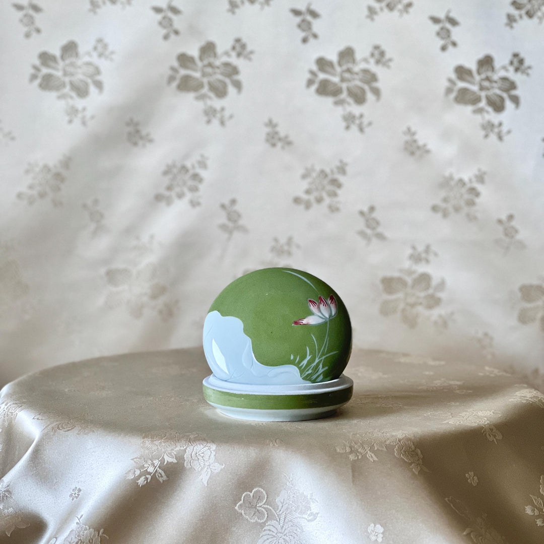 White Porcelain Covered Box: Green Slip with Lotus Motif