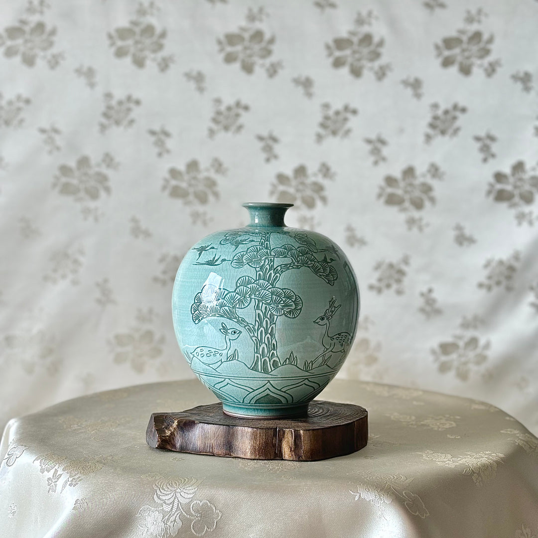 White Celadon Vase with Engraved Pine Tree, Crane and Deer Pattern