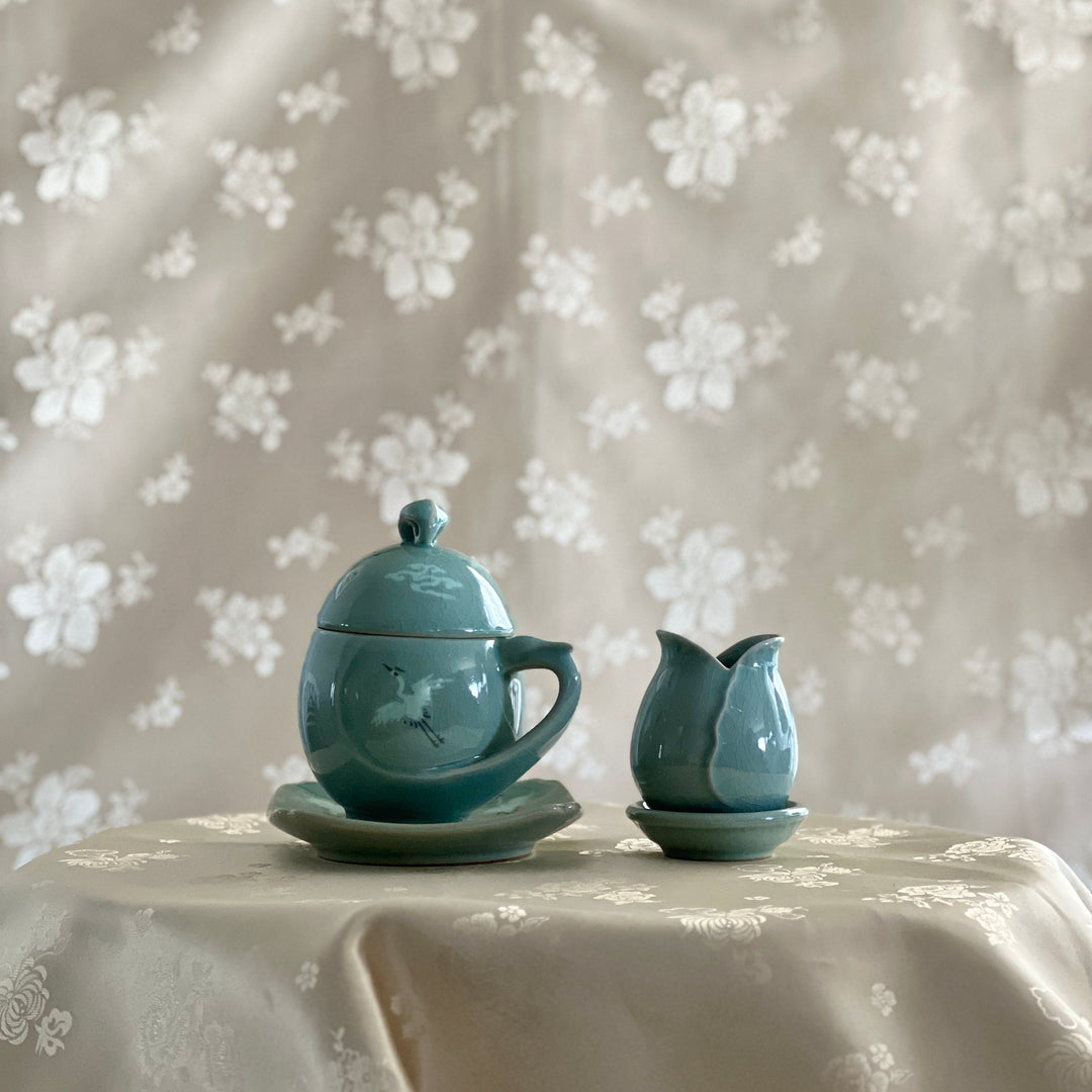 Celadon Tea Cup: Crane Egg Shaped, Inlaid Crane and Cloud Motif
