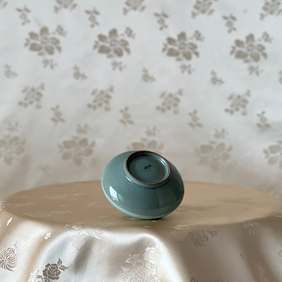 White Celadon Oil or Incense Vase with Red Plum Pattern (청자 백상감 매화문 유병)
