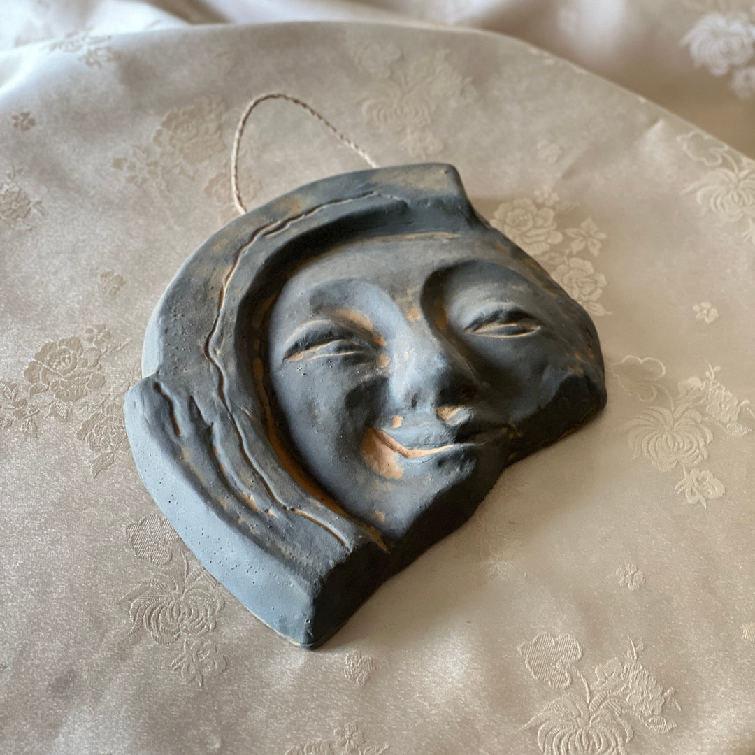 Silla Earthenware Roof-End Tile (Sumaksae): Smiling Human Face Motif