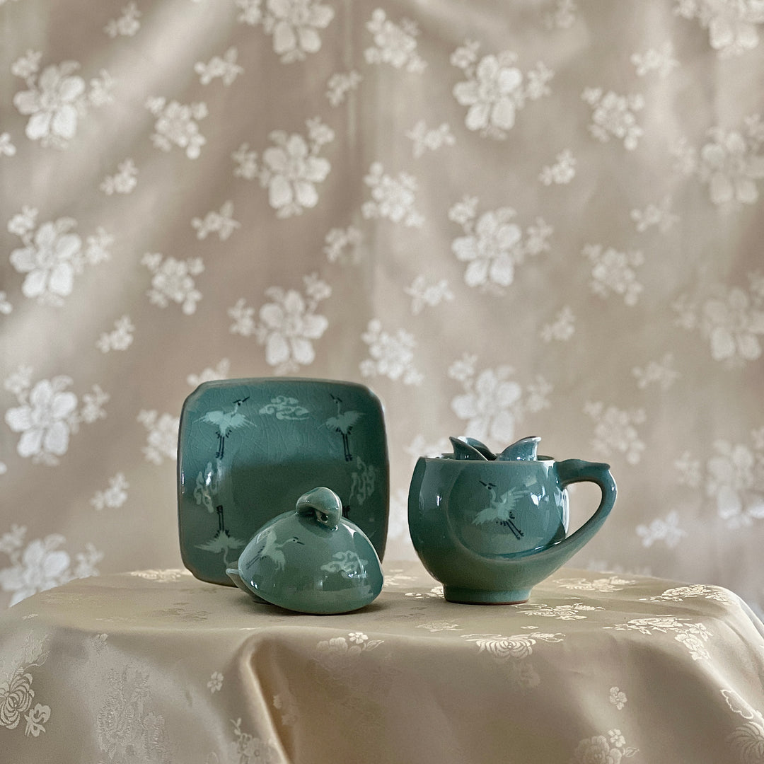 Celadon Tea Cup: Crane Egg Shaped, Inlaid Crane and Cloud Motif
