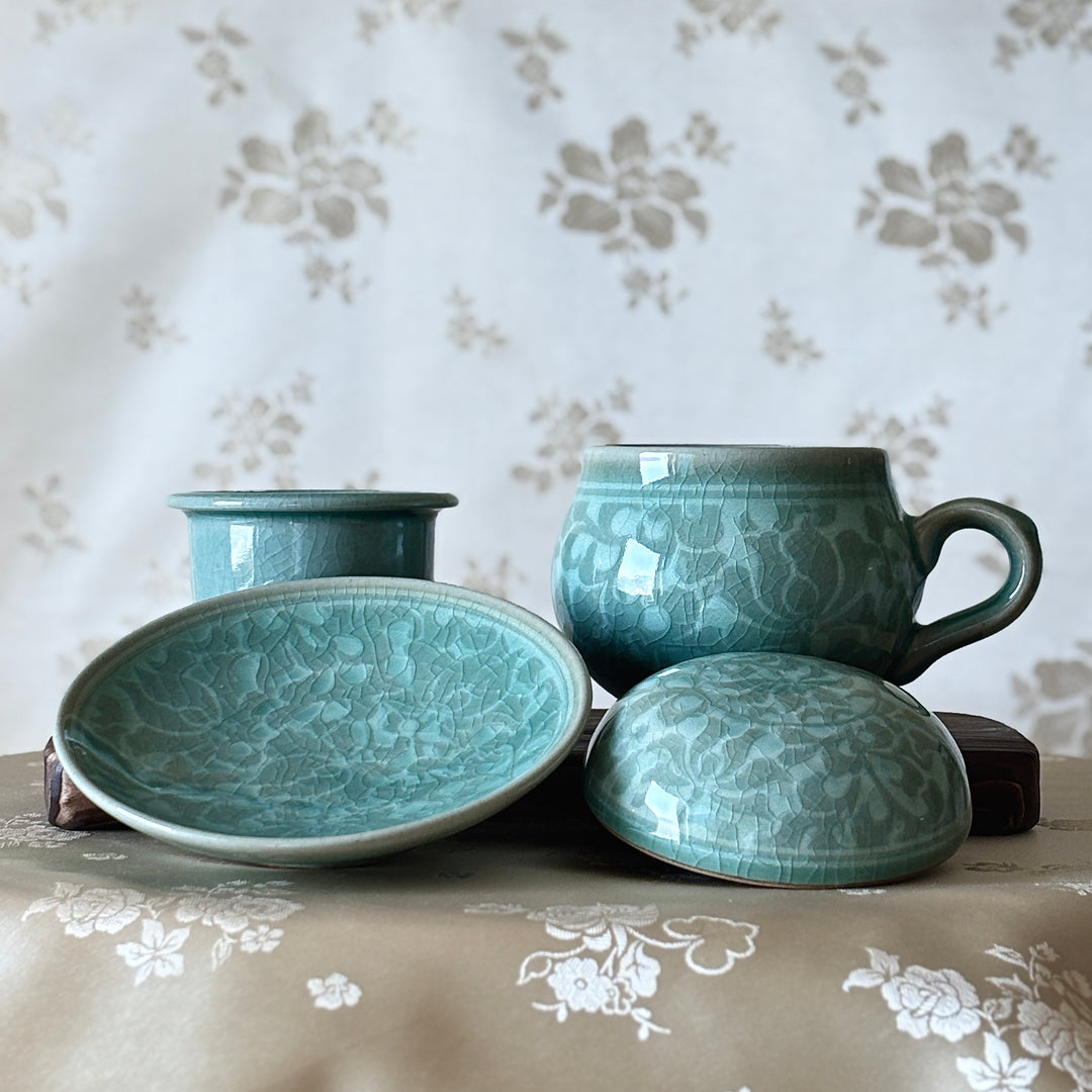 Celadon Lidded Teacup Pair: Reverse Inlaid Peony Motif with White Clay Inlay