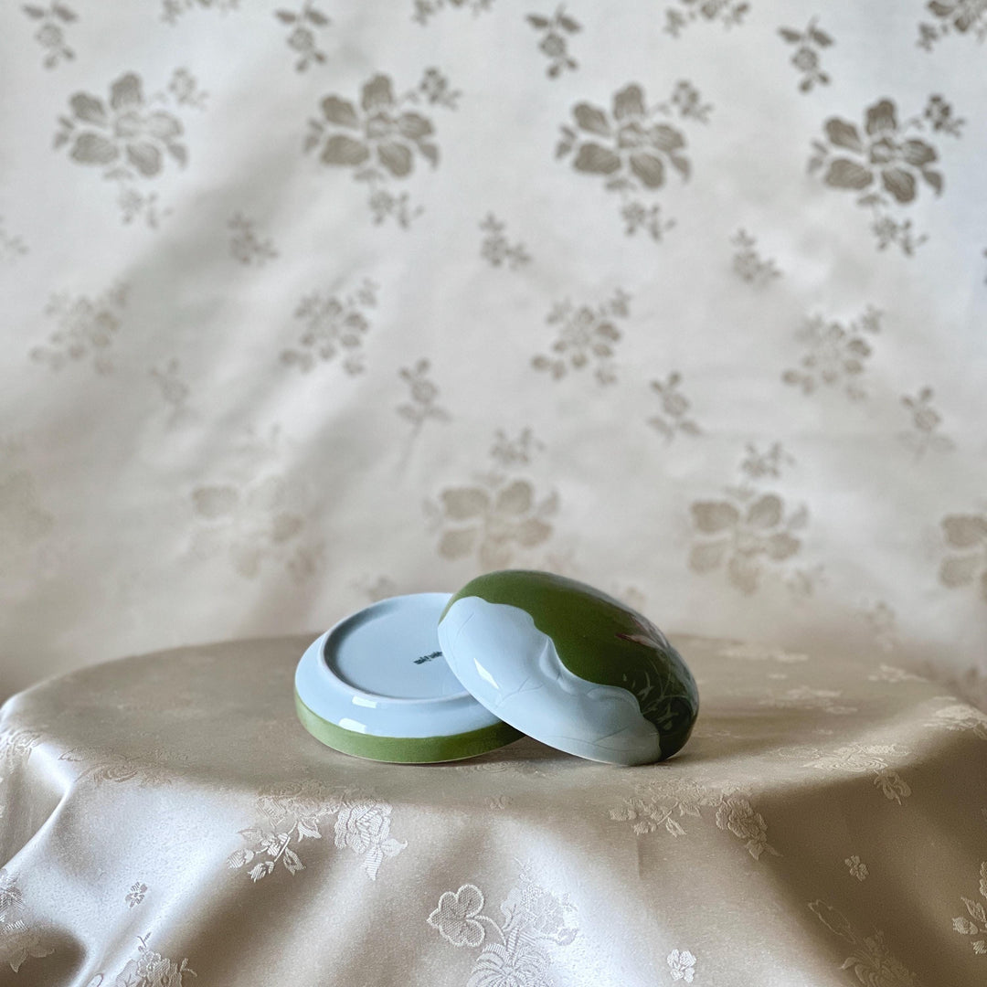 White Porcelain Covered Box: Green Slip with Lotus Motif
