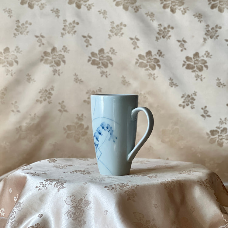 Korean white porcelain mug with hand-painted blue shrimp motif and curved handle