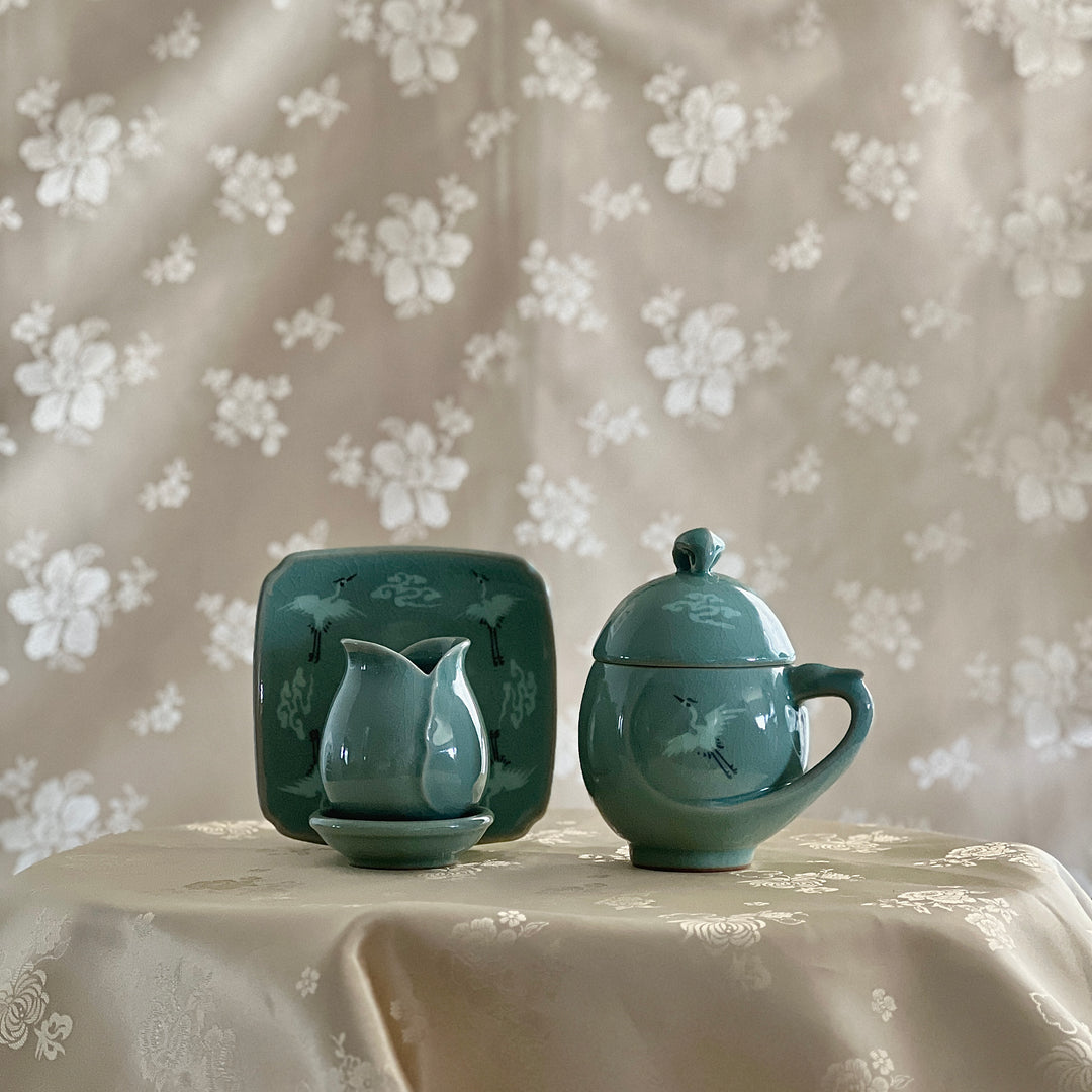 Celadon Tea Cup: Crane Egg Shaped, Inlaid Crane and Cloud Motif