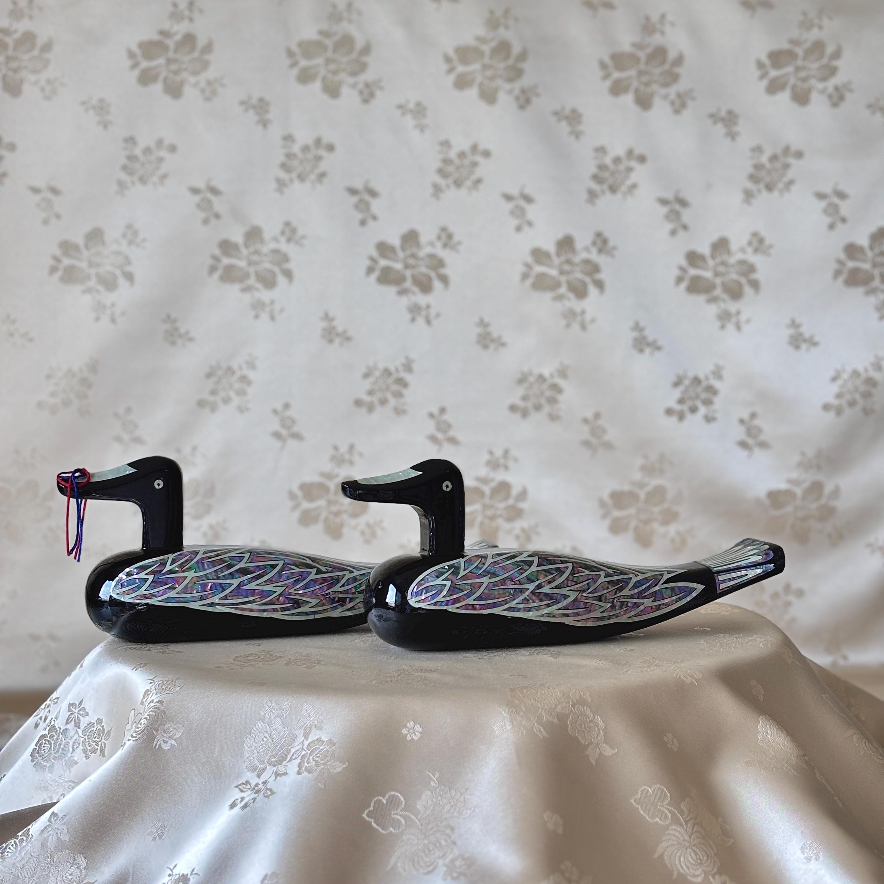 Large black lacquer Korean wedding duck pair with iridescent mother-of-pearl inlaid wings