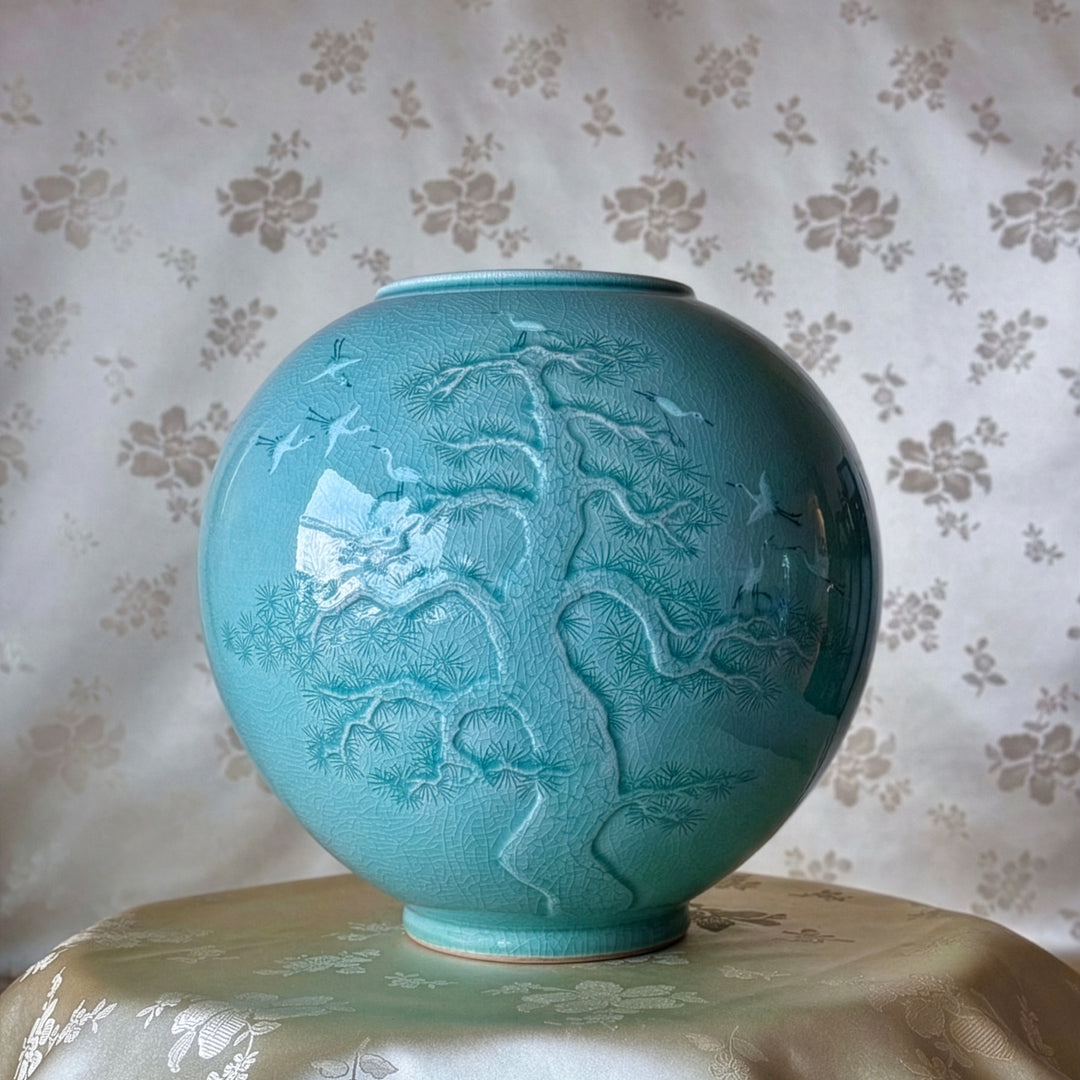 CELADON JAR (HO): PINE IN RELIEF AND INLAID CRANE MOTIF