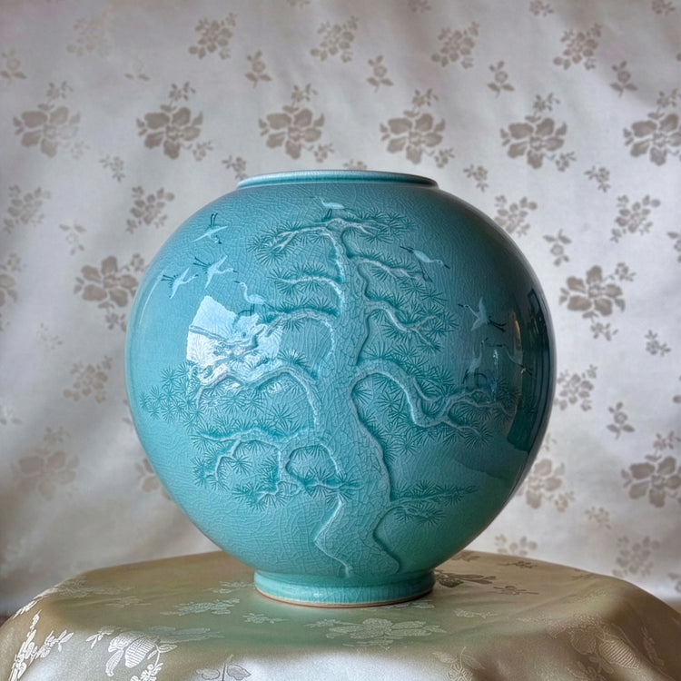 CELADON JAR (HO): PINE IN RELIEF AND INLAID CRANE MOTIF