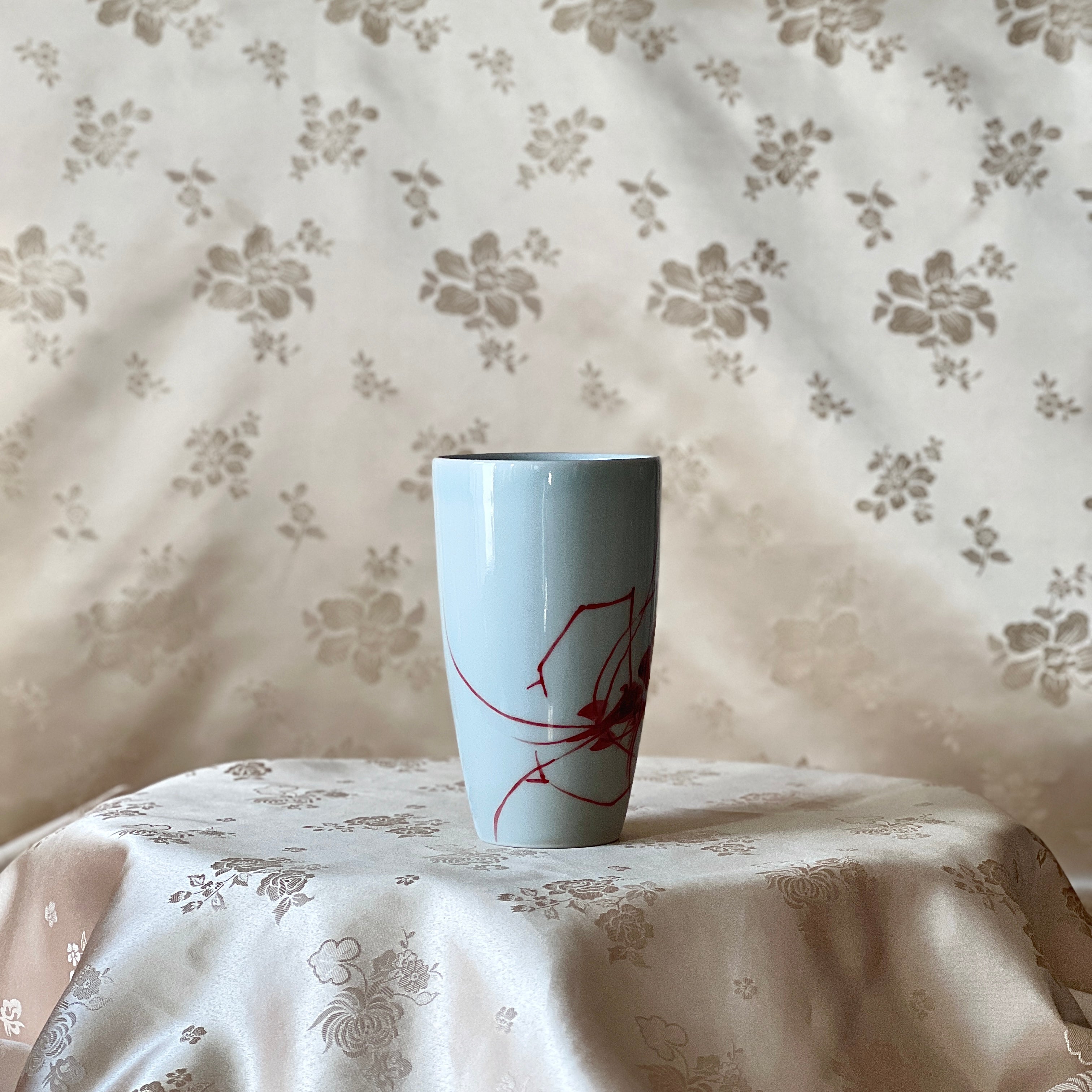 Korean white porcelain mug with hand-painted red shrimp motif and curved handle