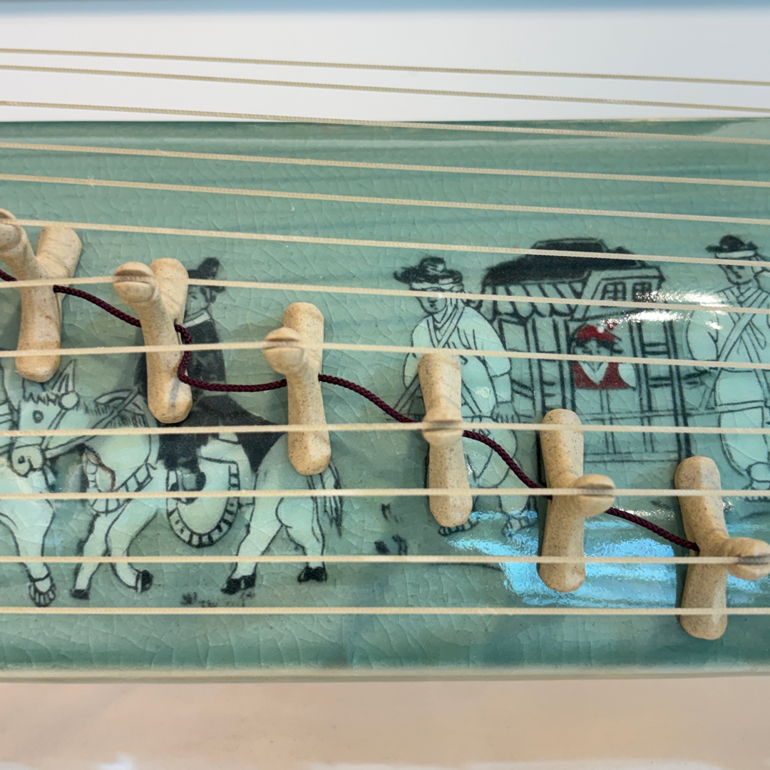 Celadon Sanjo Gayageum Sculpture: Inlaid Wedding Procession Motif