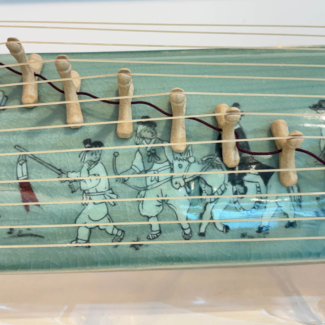 Celadon Sanjo Gayageum Sculpture: Inlaid Wedding Procession Motif