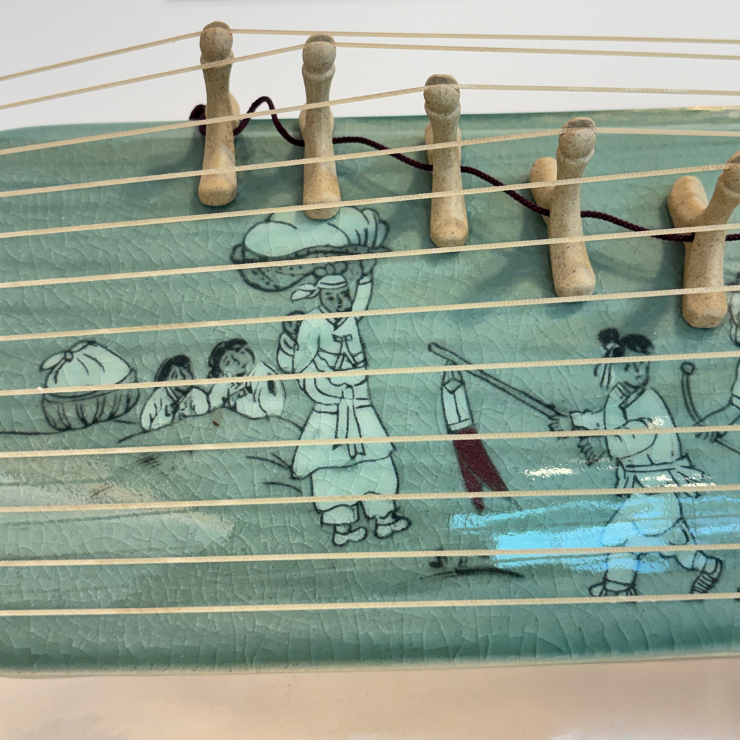 Celadon Sanjo Gayageum Sculpture: Inlaid Wedding Procession Motif