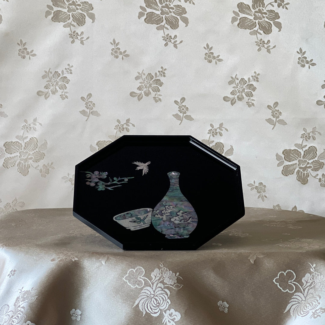Corner detail of Korean najeonchilgi tray with mother of pearl blossom inlay on silk fabric