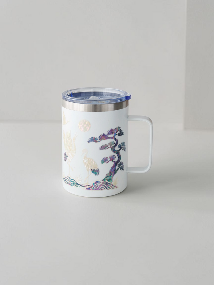 White stainless mug with handle, iridescent mother of pearl cranes and pine branches in blue and violet shell