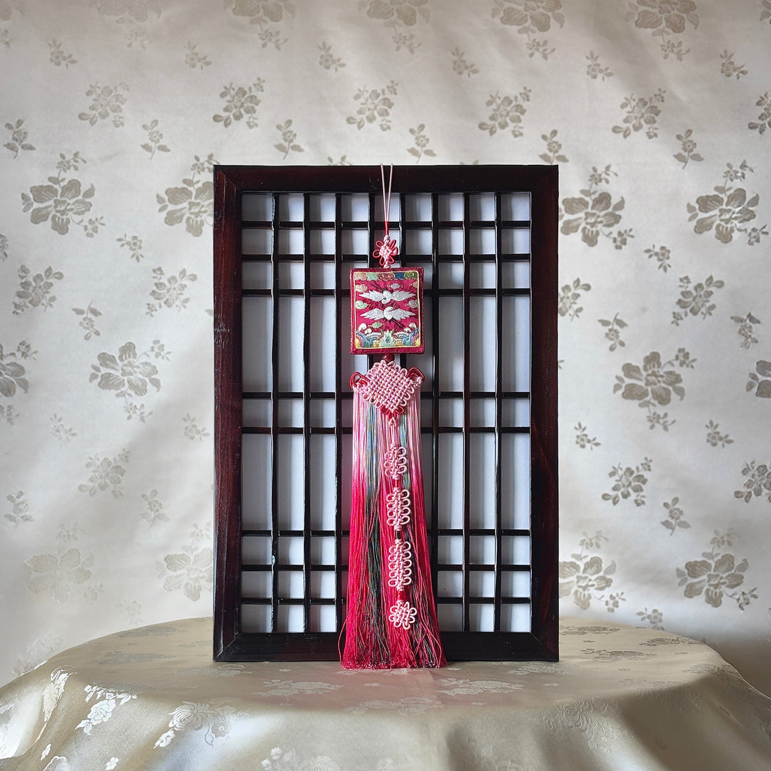 A rectangular Korean Norigae with embroidered double cranes and ornamental tassels 