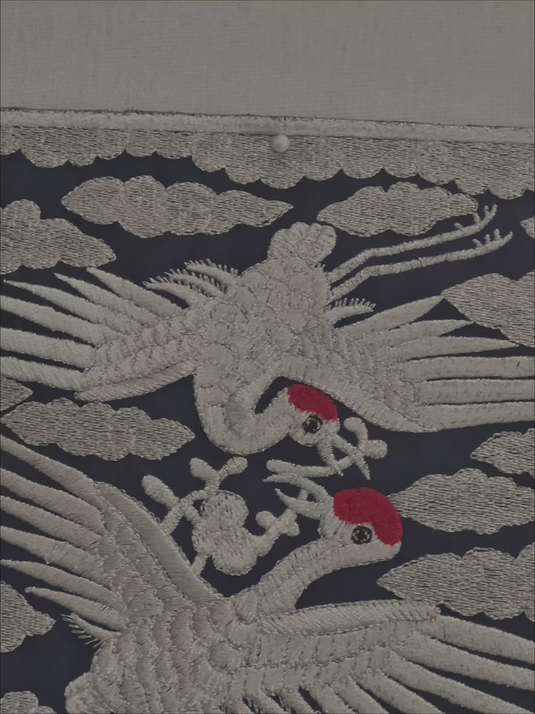 cranes-emblem-in-frame