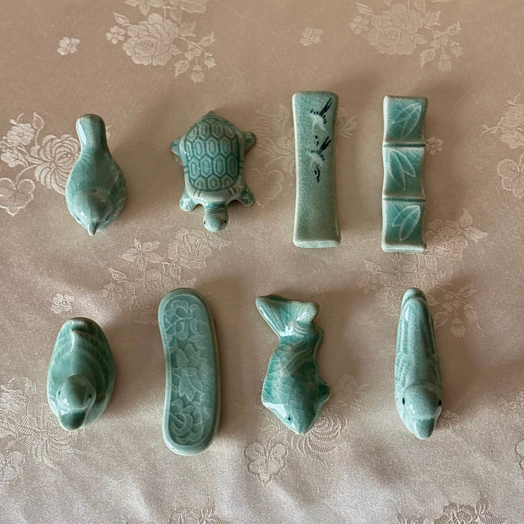 Set of green ceramic animal figurines korean traditional patterns