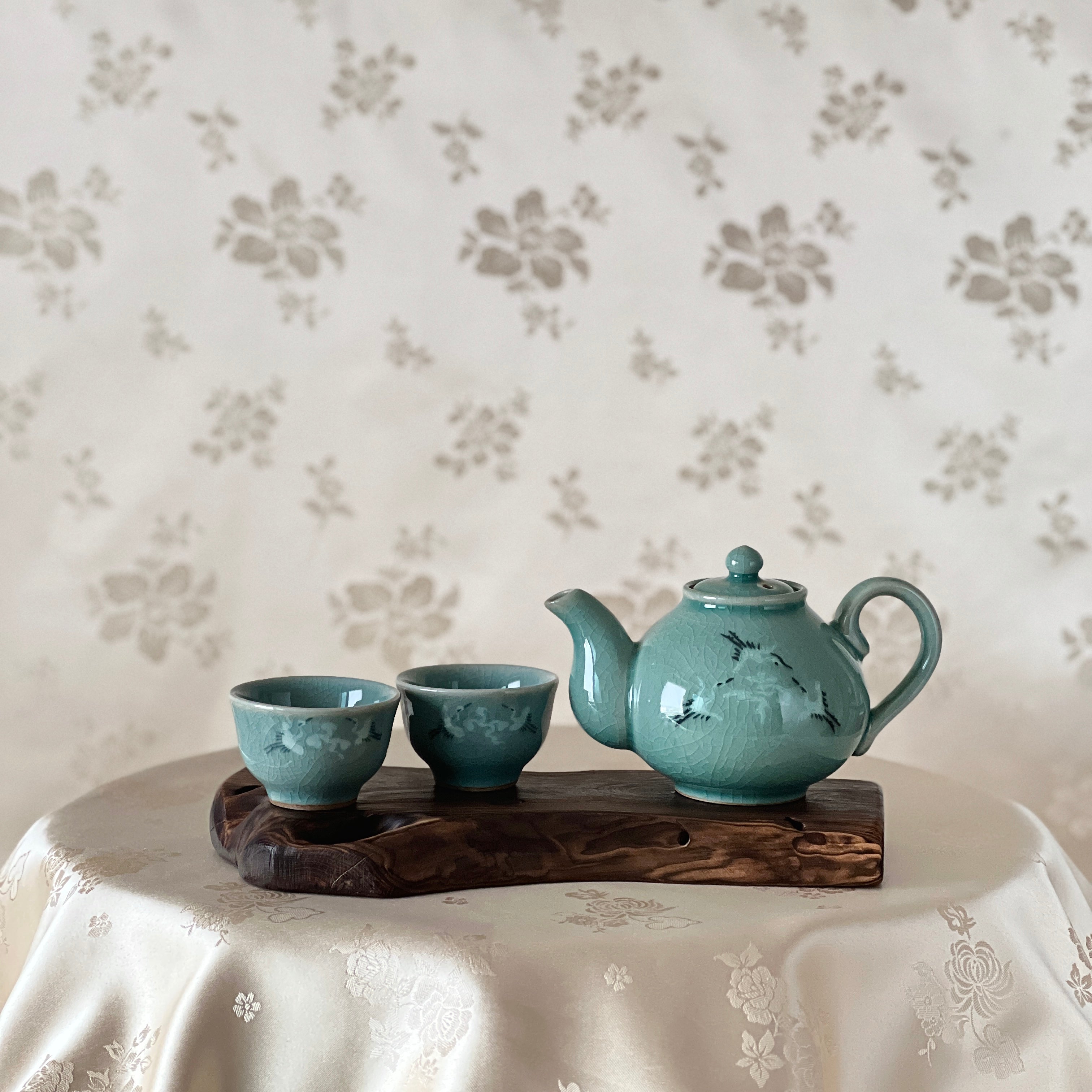 Tea set with a teapot and two cups on a wooden stand korean made