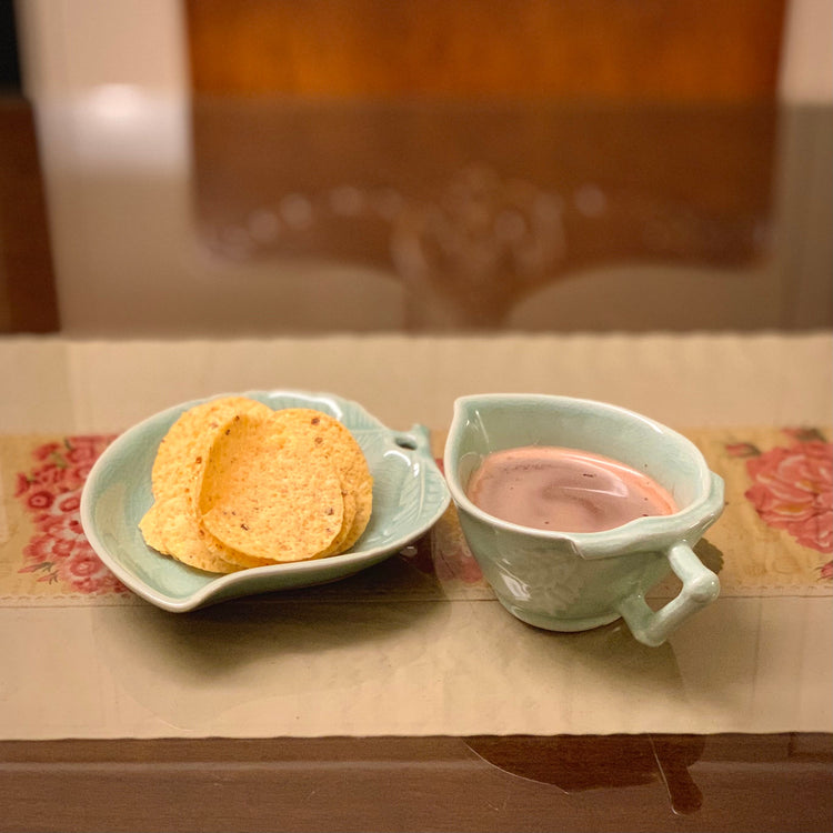Handmade Korean celadon tea cups shaped like peaches, a symbol of longevity, with leaf-shaped saucers. A meaningful gift for couples. Ships from Korea.