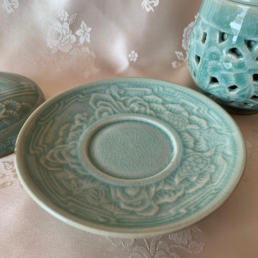 Celadon Double Wall Openwork Tea Cup with Ten Longevity Symbols Pattern Including Infuser and Plate (청자 양각 이중투각 십장생문 찻잔)
