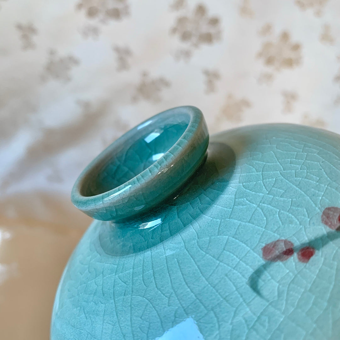 Korean traditional Celadon vase with cherry blossom pattern