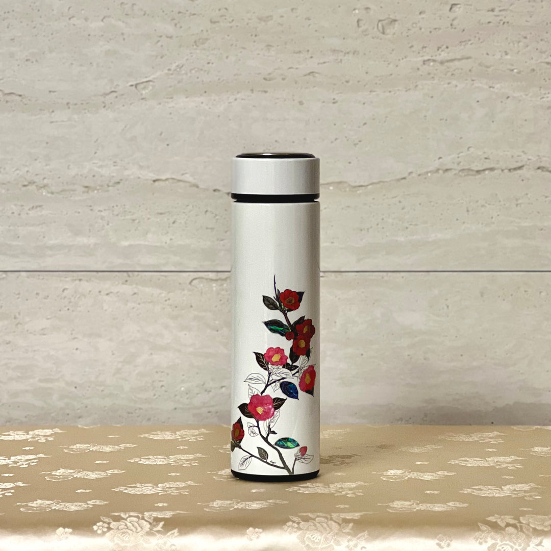 Beautiful white tumbler with Korean traditional Mother of Pearl craft with magnolia flowers